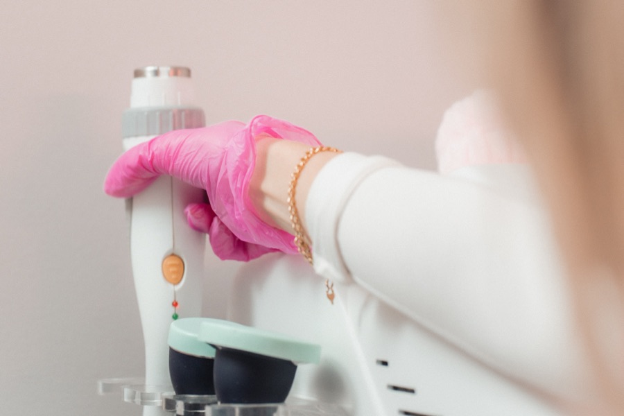 Close-up of a radiofrequency treatment handpiece in use
